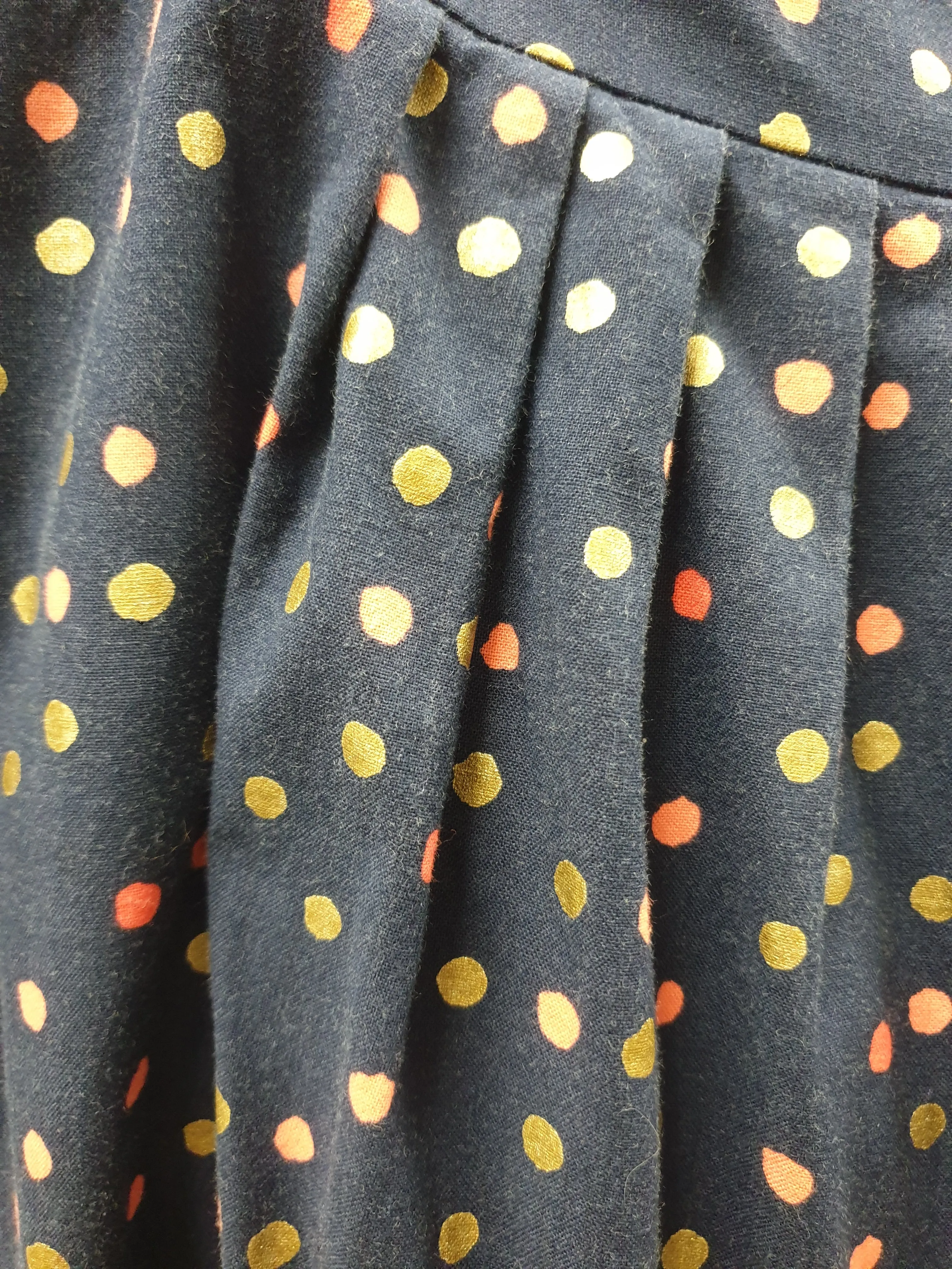 Made590 navy skirt with polka dot print size L, best fits 12-14