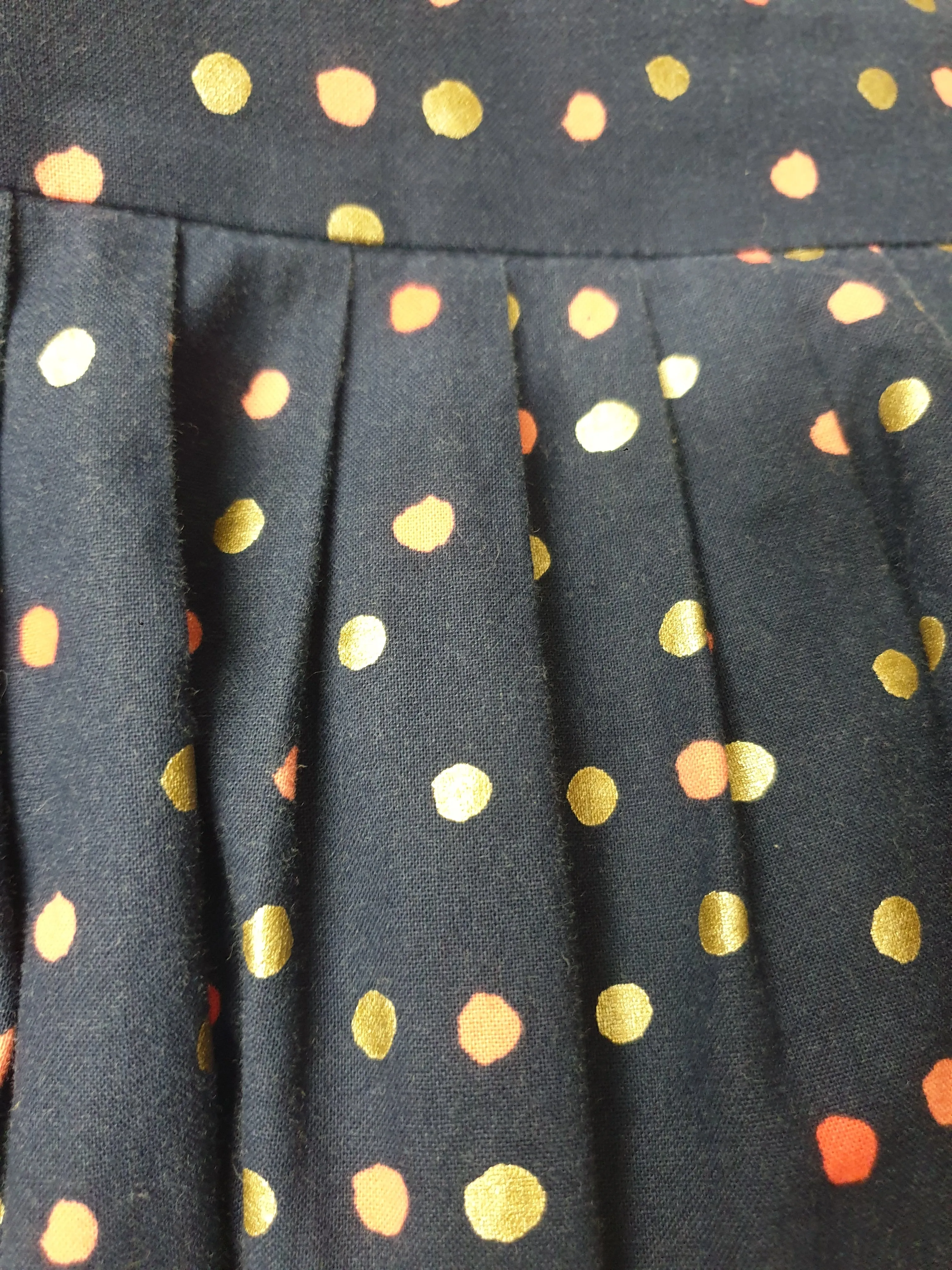 Made590 navy skirt with polka dot print size L, best fits 12-14